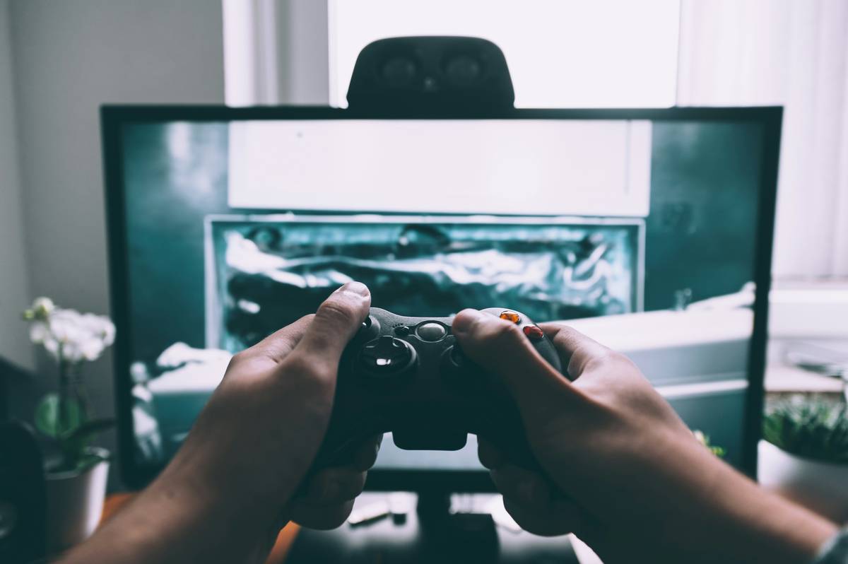 Bar chart showing 42% of 18-34yo gamers played virtual pet games in 2023 vs 29% in 2019
